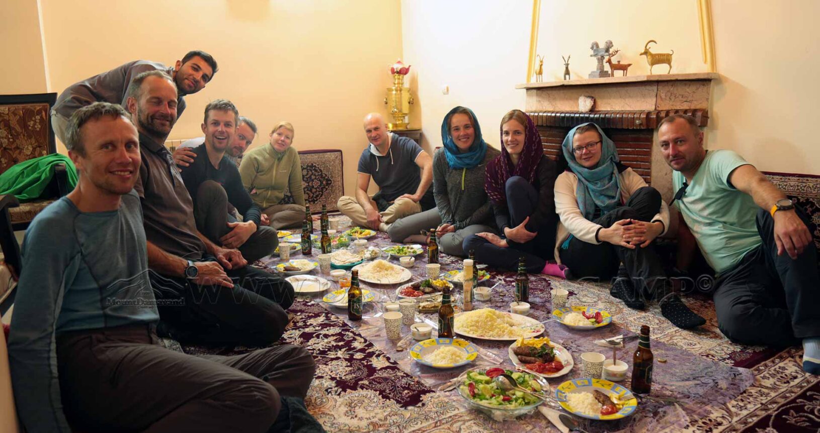 Enjoying a meal the traditional way with an Iranian family
