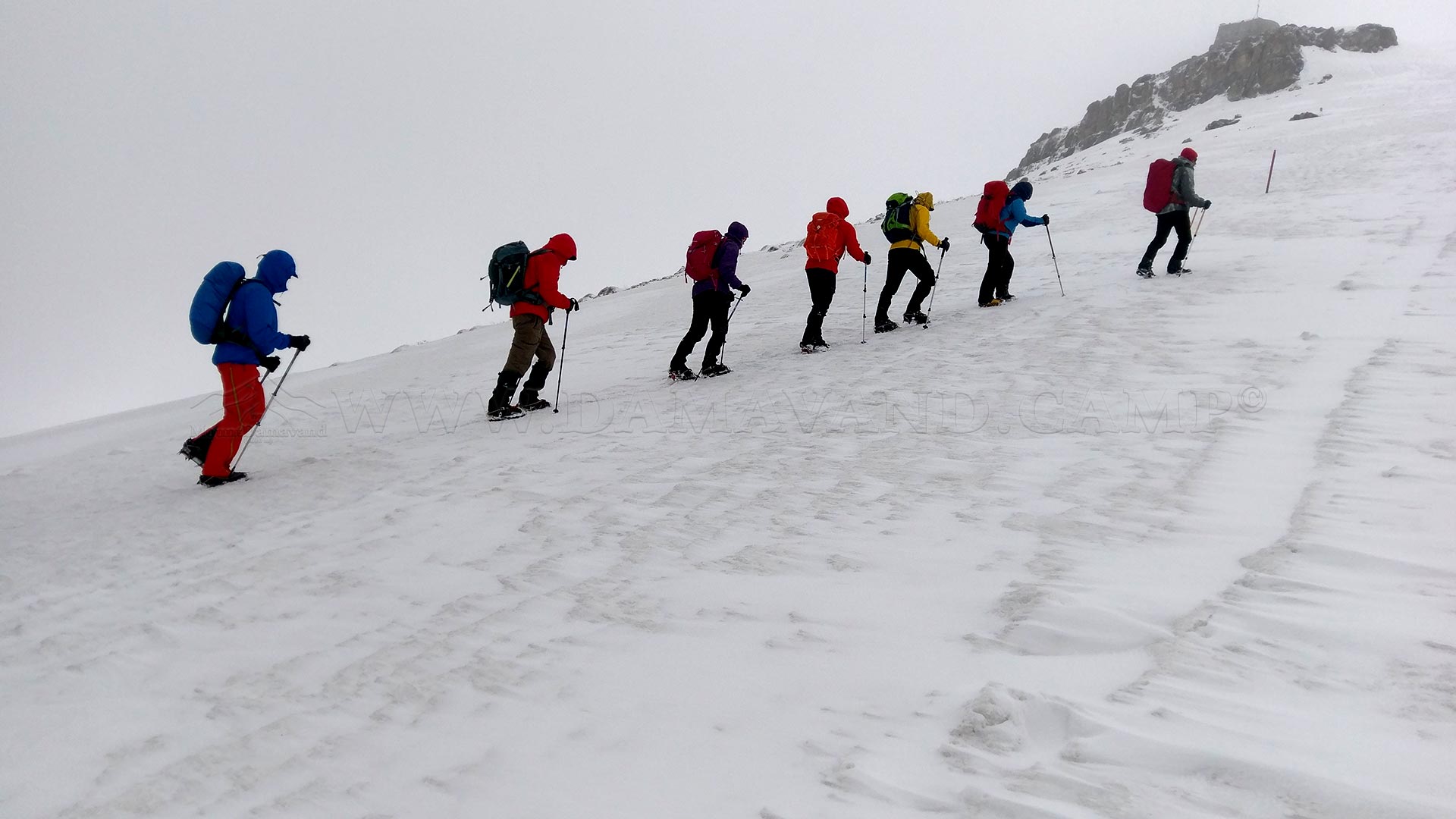 A group of mountaineers, led by the Mount Damavand Group, is heading toward Tochal Peak